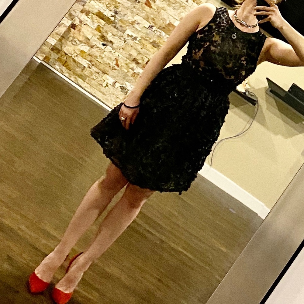 Black dress with floral appliqué and sequin detail